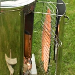 harvia flare smoker and salmon in yard
