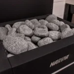 Harvia Elite Pro Stones (10-15 cm) at top of a heater