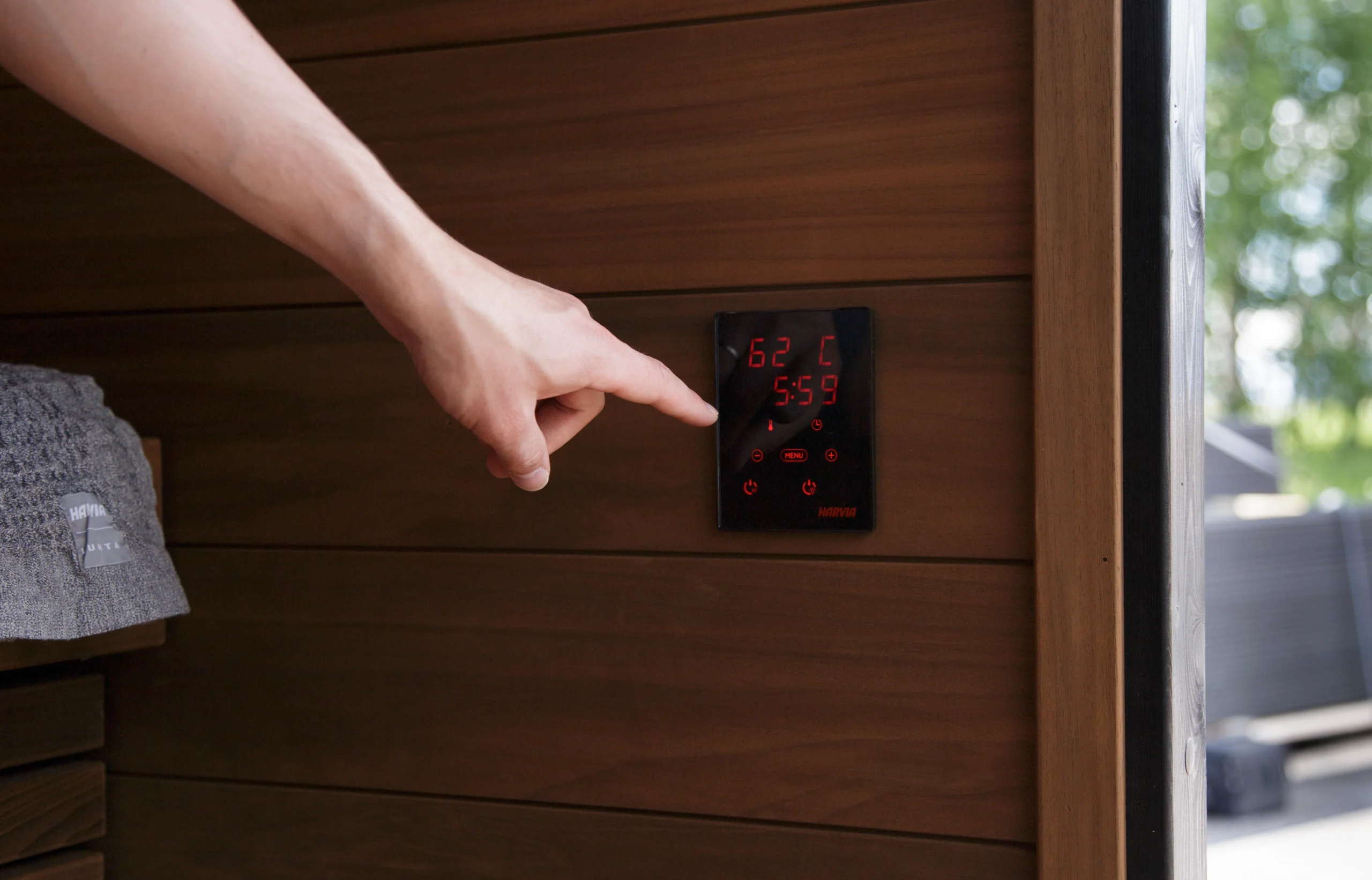 Electric sauna heater controlled remotely from a smartphone app